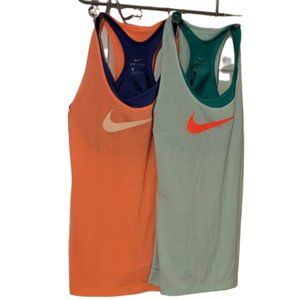 2 Nike Tanks. 2 in 1  L